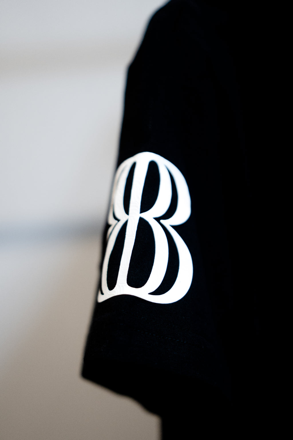 POLERA BLANKO SIDE LOGO.ZIP