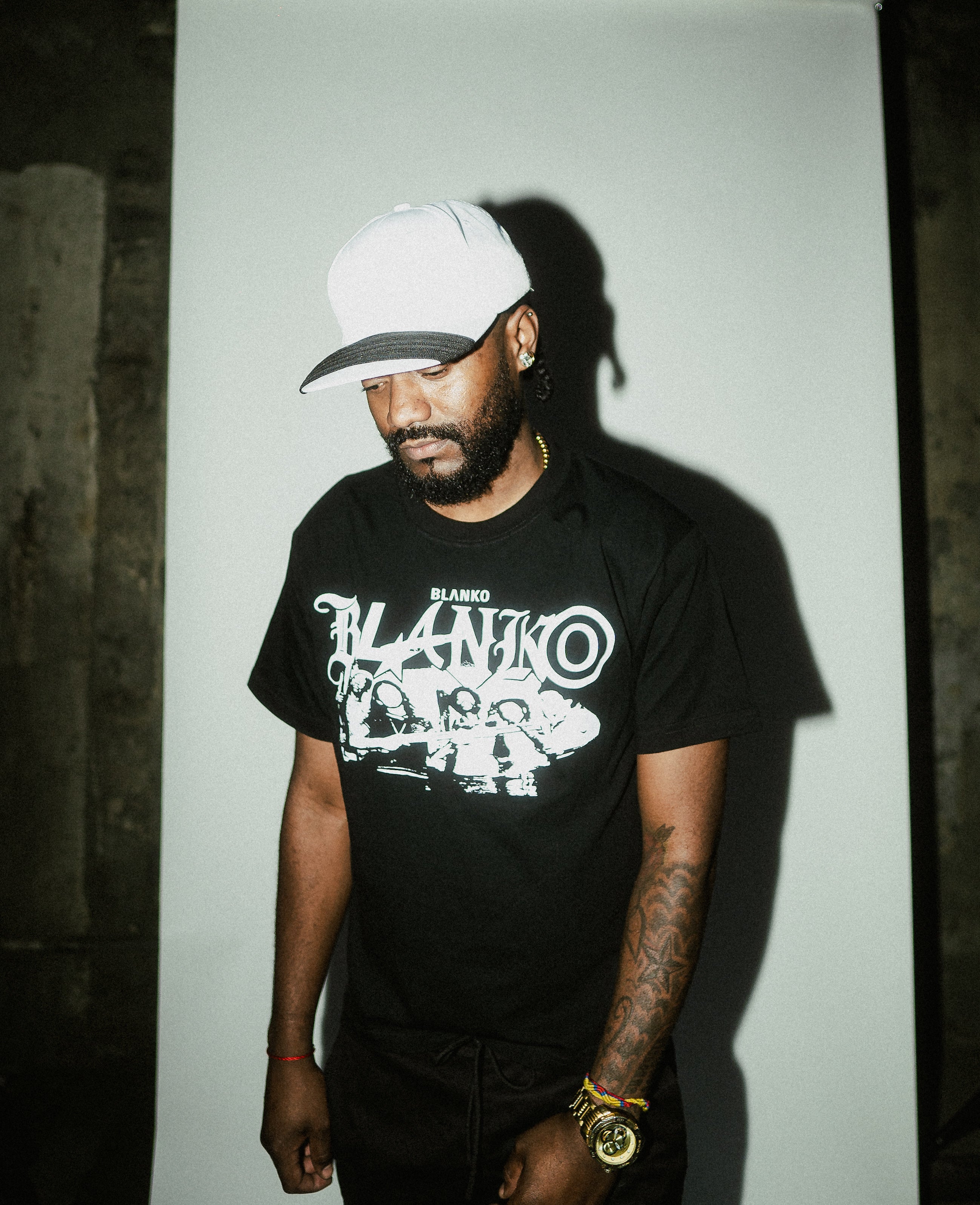 POLERA BLANKO CIUDAD DE DIOS