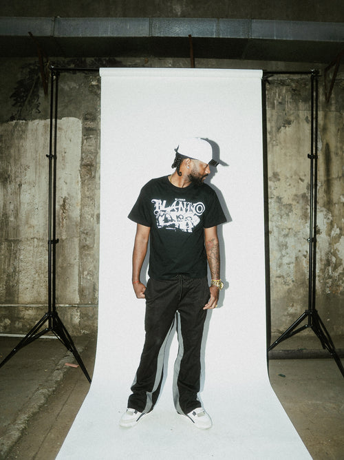 POLERA BLANKO CIUDAD DE DIOS